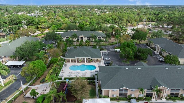 27075 Matheson Ave Unit 105, Bonita Springs, FL 34135 - aerial perspective of suburban area with a pool area