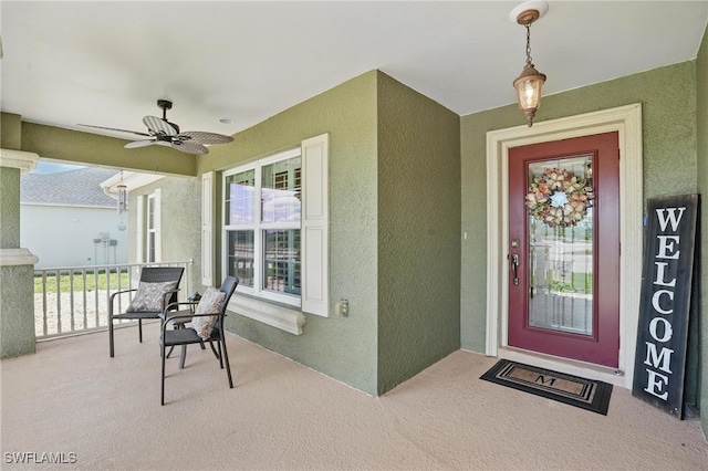 2500 El Dorado Blvd N, Cape Coral, FL 33993 - entrance to property featuring ceiling fan, stucco siding, and covered porch