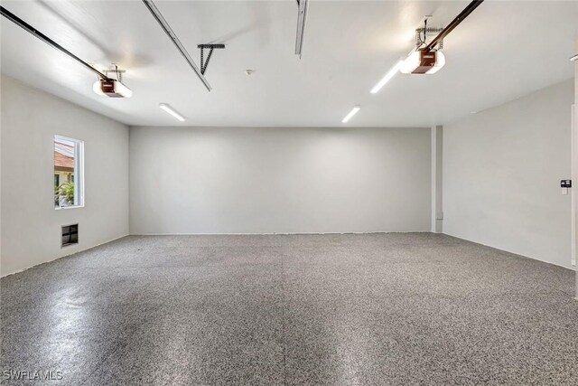 26906 Mclaughlin Blvd, Bonita Springs, FL 34134 - garage with a garage door opener