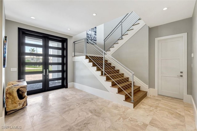 26906 Mclaughlin Blvd, Bonita Springs, FL 34134 - foyer entrance featuring french doors, stairs, baseboards, marble finish floors, and recessed lighting