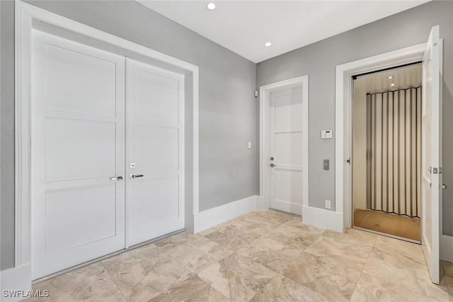 26906 Mclaughlin Blvd, Bonita Springs, FL 34134 - unfurnished bedroom with baseboards, a closet, and recessed lighting