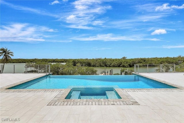 26906 Mclaughlin Blvd, Bonita Springs, FL 34134 - view of swimming pool featuring a patio, a pool with connected hot tub, and fence