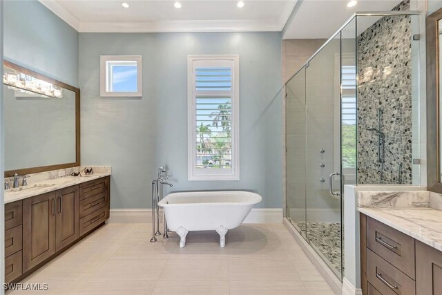 26906 Mclaughlin Blvd, Bonita Springs, FL 34134 - bathroom with a shower stall, vanity, a soaking tub, tile patterned floors, and crown molding