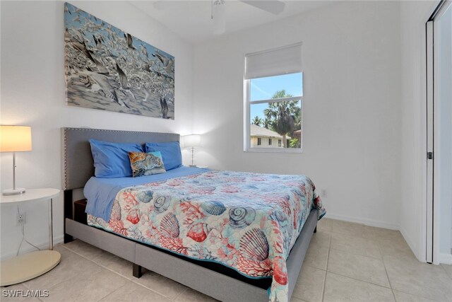 4471 Mariner Rd, Bonita Springs, FL 34134 - bedroom with tile patterned flooring, baseboards, and ceiling fan