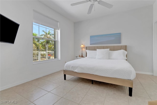 4471 Mariner Rd, Bonita Springs, FL 34134 - tiled bedroom featuring a ceiling fan and baseboards