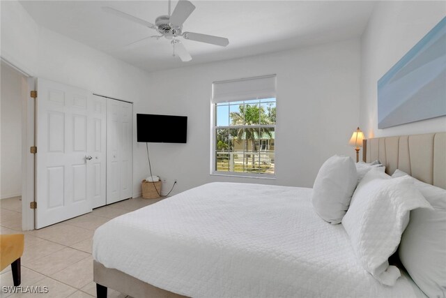 4471 Mariner Rd, Bonita Springs, FL 34134 - bedroom with light tile patterned flooring, ceiling fan, and a closet