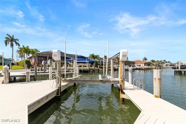 dock featuring a water view and boat lift