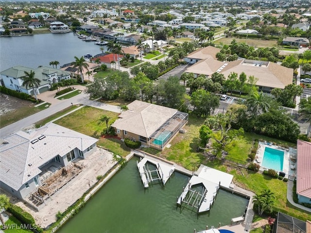view of property location featuring nearby suburban area and a nearby body of water