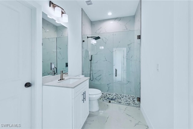 bathroom with a marble finish shower, toilet, marble finish flooring, vanity, and baseboards