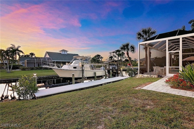 27150 Mora Rd, Bonita Springs, FL 34135 - yard at dusk with a boat dock, a lanai, a yard, and boat lift