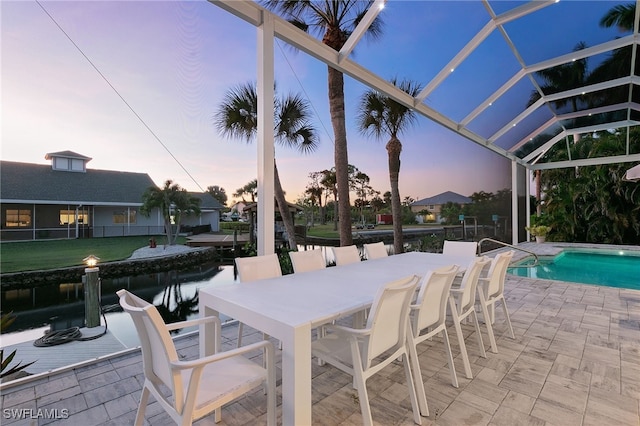 27150 Mora Rd, Bonita Springs, FL 34135 - patio terrace at dusk with a patio area and an outdoor pool