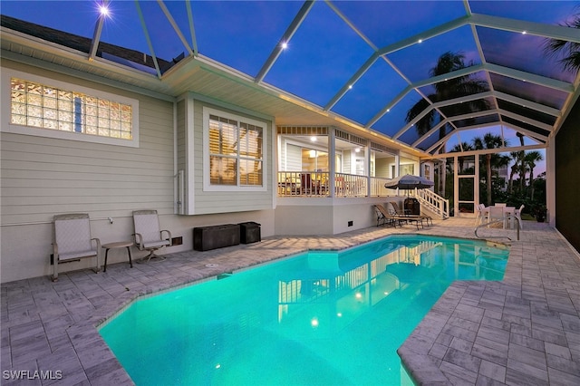 27150 Mora Rd, Bonita Springs, FL 34135 - outdoor pool featuring a patio and glass enclosure