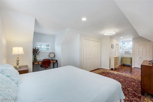 27150 Mora Rd, Bonita Springs, FL 34135 - bedroom featuring multiple windows, wood finished floors, recessed lighting, cooling unit, and baseboards