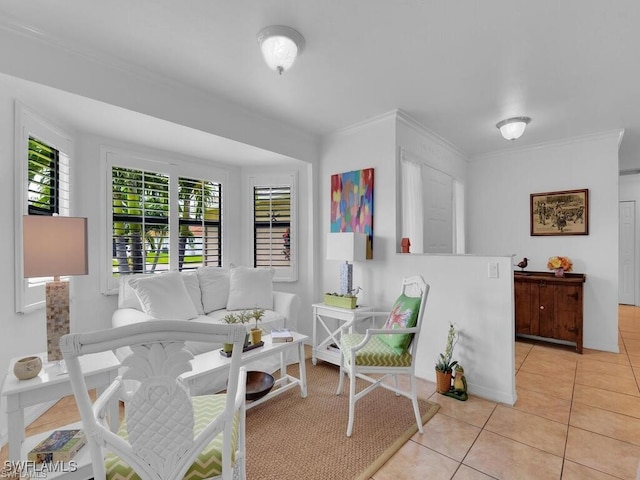 living area featuring light tile patterned floors and crown molding