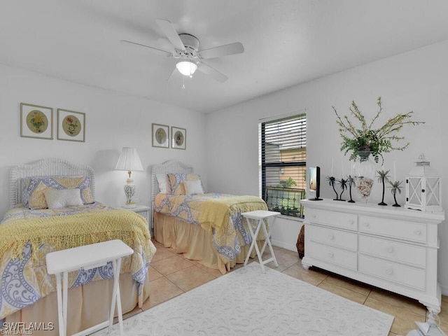 bedroom with light tile patterned flooring and ceiling fan