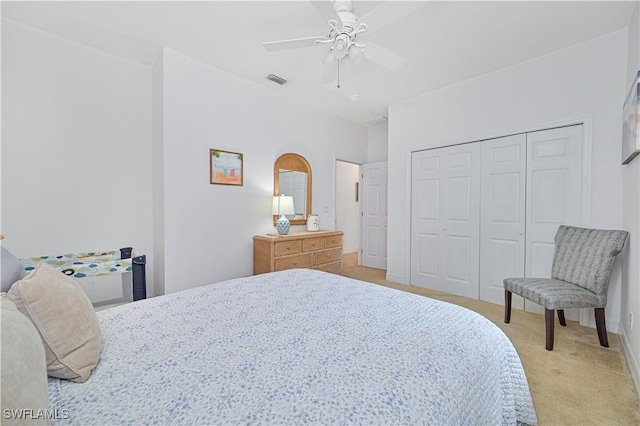 7810 Twin Eagle Ln, Fort Myers, FL 33912 - bedroom featuring a closet, light colored carpet, and a ceiling fan