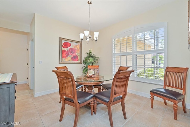 7810 Twin Eagle Ln, Fort Myers, FL 33912 - dining space featuring a chandelier, light tile patterned floors, and baseboards