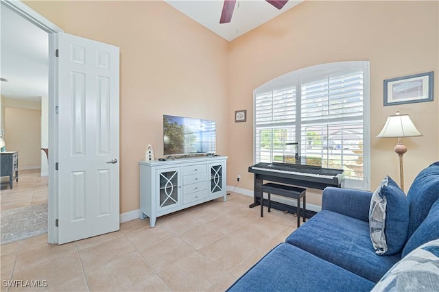 7810 Twin Eagle Ln, Fort Myers, FL 33912 - living room featuring light tile patterned floors, ceiling fan, and baseboards