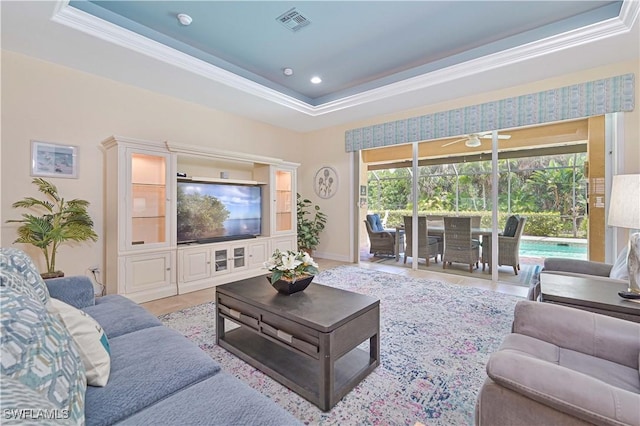 7810 Twin Eagle Ln, Fort Myers, FL 33912 - living area featuring a tray ceiling, crown molding, recessed lighting, and baseboards