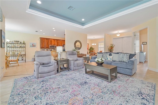 7810 Twin Eagle Ln, Fort Myers, FL 33912 - living area featuring light tile patterned flooring, recessed lighting, baseboards, a chandelier, and a tray ceiling