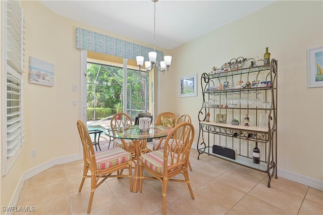 7810 Twin Eagle Ln, Fort Myers, FL 33912 - tiled dining room featuring a chandelier, healthy amount of natural light, and baseboards