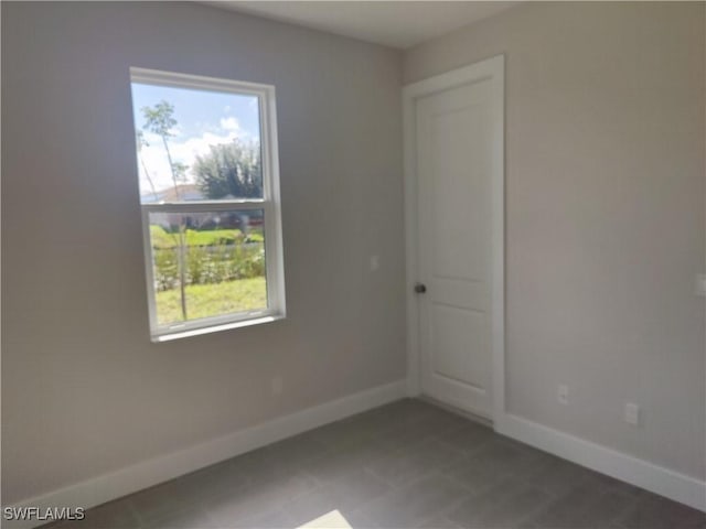 3607 SW 8th Ct, Cape Coral, FL 33914 - spare room featuring baseboards