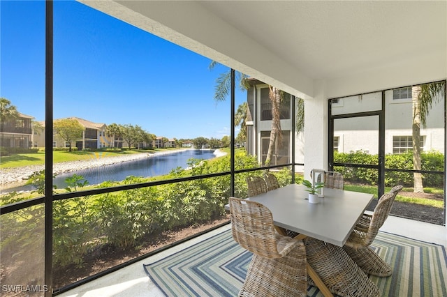 4485 Dover Ct Unit 1202, Naples, FL 34105 - sunroom featuring a water view