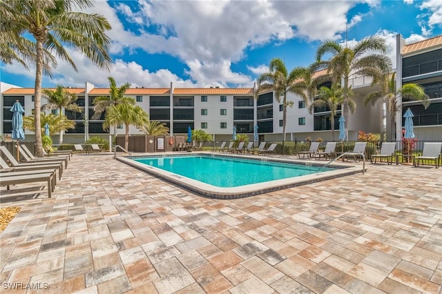 226 3rd St Unit 208, Bonita Springs, FL 34134 - community pool featuring a patio area