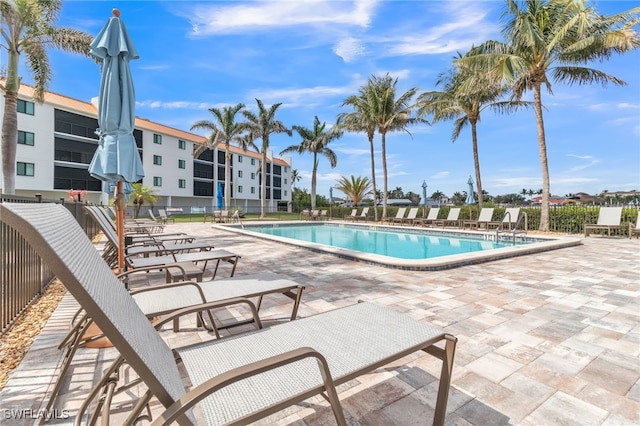 226 3rd St Unit 208, Bonita Springs, FL 34134 - community pool featuring a patio area