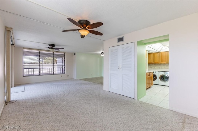 3460 N Key Dr Unit 210, North Fort Myers, FL 33903 - unfurnished living room with light colored carpet, ceiling fan, and baseboards