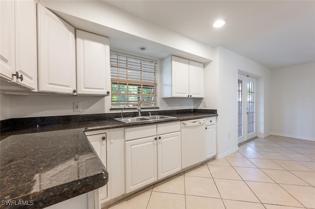 kitchen featuring a sink, dishwasher, healthy amount of natural light, white cabinets, and recessed lighting