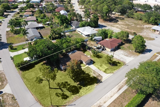 aerial perspective of suburban area featuring property boundaries highlighted