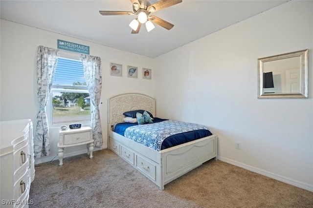 1713 NW 9th Ter, Cape Coral, FL 33993 - carpeted bedroom with a ceiling fan and baseboards