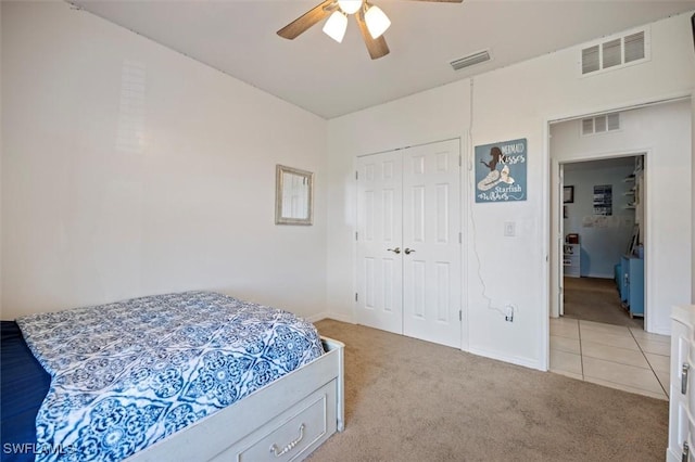 1713 NW 9th Ter, Cape Coral, FL 33993 - bedroom featuring light carpet, a closet, and ceiling fan