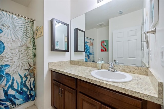 1713 NW 9th Ter, Cape Coral, FL 33993 - full bathroom with vanity and a shower with shower curtain