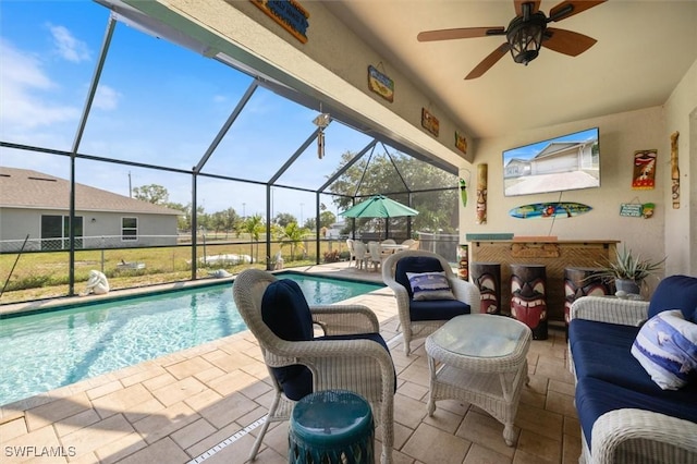 1713 NW 9th Ter, Cape Coral, FL 33993 - swimming pool with an outdoor living space, a patio, glass enclosure, and a ceiling fan