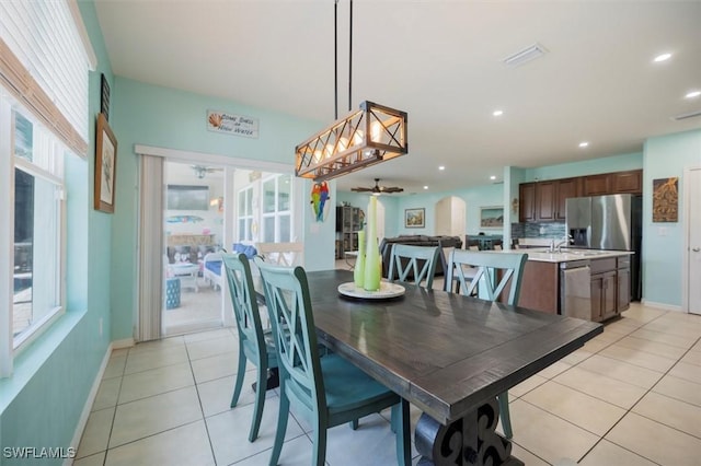 1713 NW 9th Ter, Cape Coral, FL 33993 - dining room featuring ceiling fan, light tile patterned floors, and recessed lighting