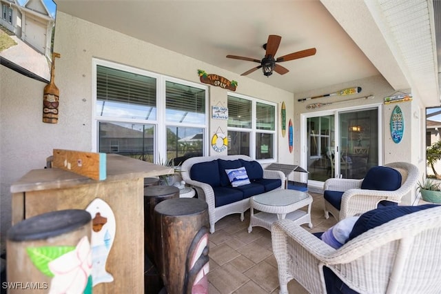 1713 NW 9th Ter, Cape Coral, FL 33993 - view of patio featuring a ceiling fan and an outdoor living space