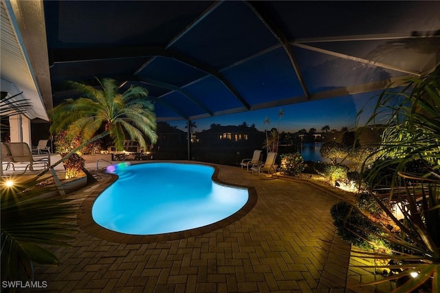 170 June Ct, Marco Island, FL 34145 - swimming pool featuring a fire pit, a patio, a lanai, and a water view