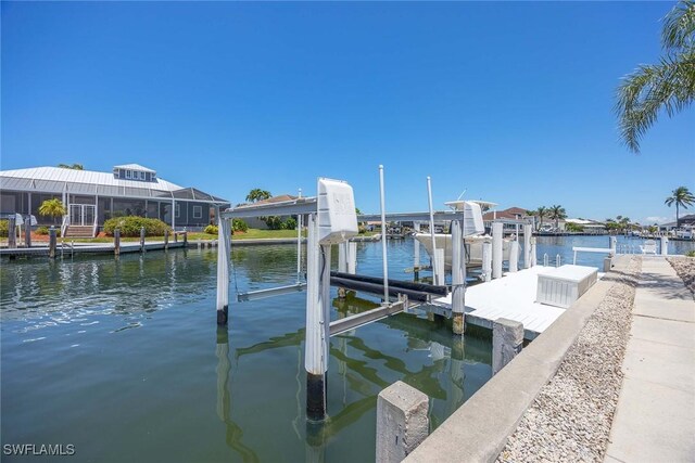 170 June Ct, Marco Island, FL 34145 - dock area featuring boat lift and a water view