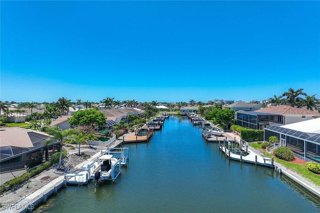 170 June Ct, Marco Island, FL 34145 - water view featuring a dock, nearby suburban area, and boat lift
