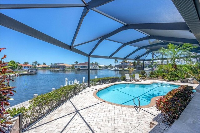 170 June Ct, Marco Island, FL 34145 - outdoor pool with a water view, a patio area, and a lanai