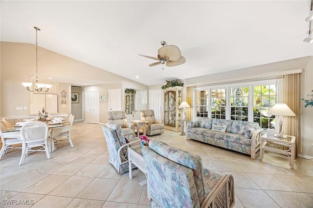 170 June Ct, Marco Island, FL 34145 - living room featuring vaulted ceiling, a chandelier, light tile patterned floors, and a ceiling fan