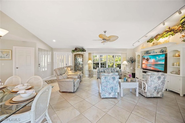 170 June Ct, Marco Island, FL 34145 - living room with rail lighting, a ceiling fan, light tile patterned floors, and vaulted ceiling