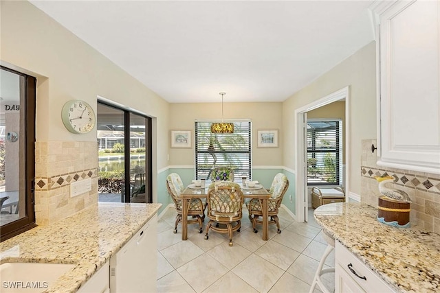 170 June Ct, Marco Island, FL 34145 - dining space featuring light tile patterned floors