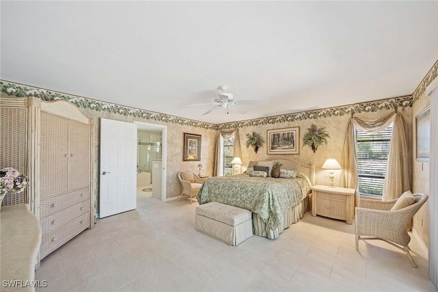 170 June Ct, Marco Island, FL 34145 - bedroom with wallpapered walls, a ceiling fan, and ensuite bathroom