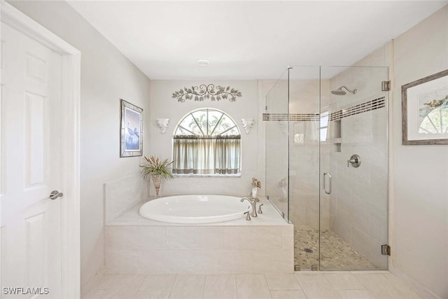 170 June Ct, Marco Island, FL 34145 - full bath with a garden tub, a shower stall, and tile patterned floors