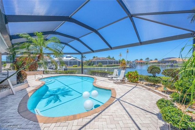 170 June Ct, Marco Island, FL 34145 - swimming pool with a patio, a water view, and glass enclosure