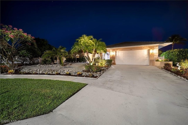 170 June Ct, Marco Island, FL 34145 - single story home featuring a garage, concrete driveway, and stucco siding
