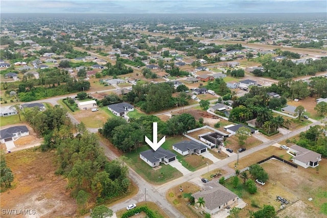 3201 18th St W, Lehigh Acres, FL 33971 - aerial overview of property's location with nearby suburban area